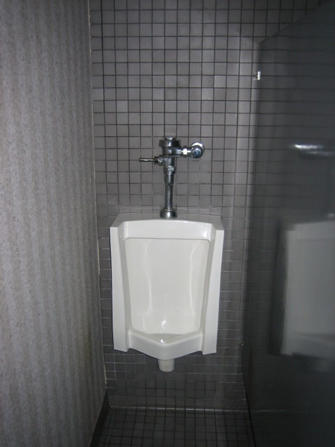 Urinal in a narrow space