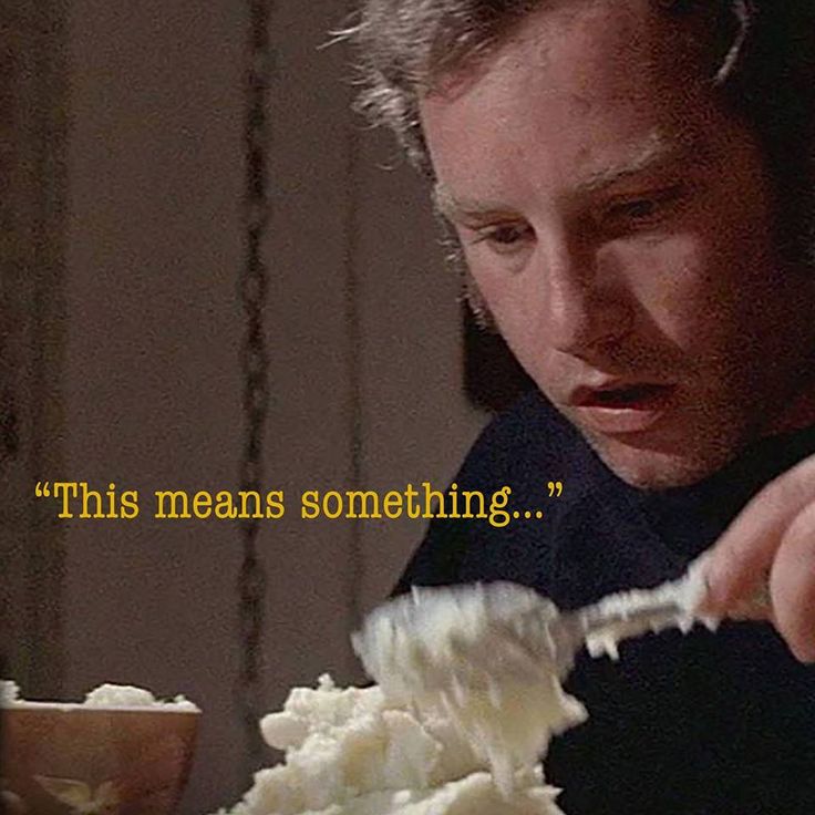 Capture from 'Close Encounters of the Third Kind' where Richard Dreyfus as Roy Neary makes a mountainous shape from mashed potatoes